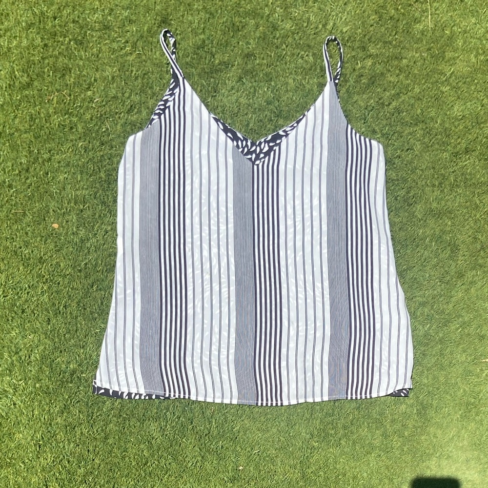 Two way top white and black strips on one side black and white pattern